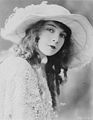 Lillian Gish, another (apparently) major film star, ranked 17th best actress ever by AFI. There's some weirdness around her lip (early photoshopping? :) ) and a bit of scratches but it's very sharp and high-res compared to its peers