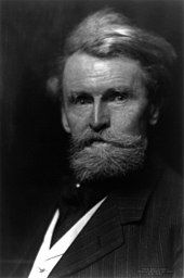 Left-looking half-length portrait of a bearded man of about 60