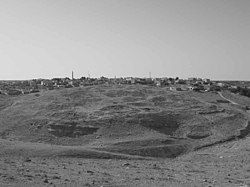 Ancient Dhiban with modern settlement in the background, looking south