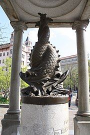 Sculpture of two dolphins inside the enclosure