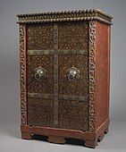 18th century cabinet, lacquer and gilding on wood, iron. The decoration includes skulls and skeletons.