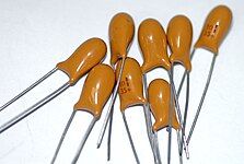 Dipped laquered tantalum “pearl” capacitors