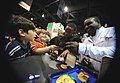 WCAP athletes sign autographs for fans, 2009 AUSA Conference.