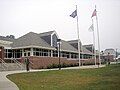 Chambers Hall contains a dining hall, athletic facilities, book store, health center, student services and information desk. It features a stained glass window of the university seal by Terry Bengel