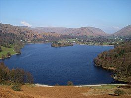 A lake surrounded by hills