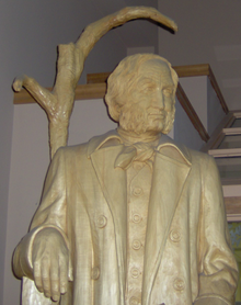 Wooden statue of a man with beard