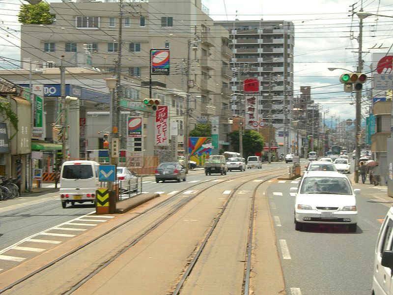 File:Asahi-ekimaedori-tramstop-Neighborhood.jpg