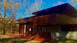 Exterior view of the Bachman-Wilson House after its relocation at Crystal Bridges in Bentonville, AR.