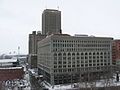 Seneca One Tower (then named One HSBC Center) behind Ellicott Square Building