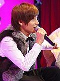 Leeteuk during a public broadcast of Kiss the Radio, 2009