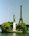 Statue of Liberty (with the Eiffel Tower in background)