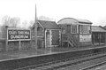 The up platform at Dundrum Station complete with a sign for St Columba's College on the signal box.