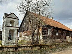 Warmian wooden house and chapel in Kajny.