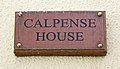 Plaque at the entrance to Calpense House.