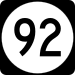 Black and white circle depicting the number "92"