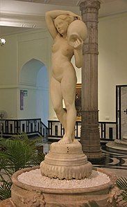 Marble statue based on The Source by Jean Ingres. Statue was formerly on display in Musee du Louvre.