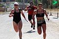 Ruth Anderson-Horrell (l) and Christy Phillips Adkins (r) sprint to the finish line of the 2012 Reebok CrossFit Games event 2.