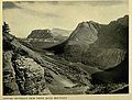 Looking south from Triple Divide Mountain, 1917. Bad Marriage Mountain (left of center) and Medicine Grizzly Peak right[8]