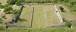 One of the ballcourts at Xochicalco. Note the characteristic -shape, as well as the rings set above the apron at center court. The setting sun of the equinox shines through the ring.[11]