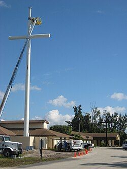 Epiphany Lutheran Church, in the Lake Worth Corridor, erecting its cross.