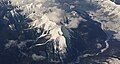 Aerial view of Mt. Wardle (centered), Mt. Verendrye (top, left) and Vermilion River (right)