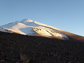 El Ermitaño as seen at sunrise from a camp above Laguna Verde