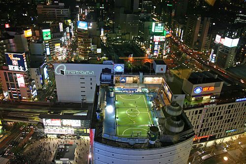 A futsal pitch in use on the top of a tower block in Tokyo, Japan