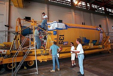 Centaur IIA for the TDRS-I mission is inspected in Hangar J at Cape Canaveral.