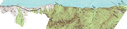 Edited version of a high resolution USGS topographical chart of the Kalalau Trail. On the left portion of the image the Kalalau Valley below 800 feet elevation is shown. Also, a portion of the Kalalau Trail is shown as a black line. On the top right portion of the image the end of the paved road is shown as a black line.