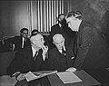 Image 11John L. Lewis (right, President of the United Mine Workers, confers with Thomas Kennedy (left), UMW Secretary-Treasurer of the UMW, and a UMW official at the War Labor Board in 1943 about a coal miners' strike.