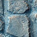 Minerals that form in water have been detected in the cliffs of the Aram Chaos region of Mars, as pictured.