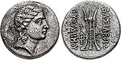 Cupro-nickel coin of Euthydemus II, c. 185-180 BC with Laureate head of Apollo, and Tripod on the reverse.