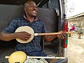 Niger and northern Nigeria. Fulani musician playing a gourd bodied garaya. The Hausa also make the instrument, with a wood body.[136][137]