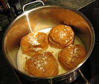 Semla served with warm milk