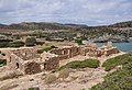 View north from excavated buildings on East Akropolis, overlooking beach and bay of Eremoupolis, with Itanos Promontory in the background