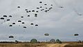 American paratroopers jump from Lockheed C-130 Hercules aircraft