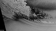 Defrosting going on in Playfair crater, as seen by CTX camera (on Mars Reconnaissance Orbiter). Dark areas are where frost has disappeared thereby showing dark ground. Note: this is an enlargement of the previous image of Playfair crater.