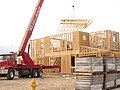 A set of trusses placed atop a home under construction