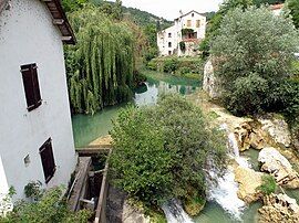 The watermill and waterfall on the Vers [fr] river