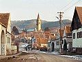 Main street of Amnaș village with the Saxon fortified church in the background