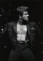 A man with an open shirt