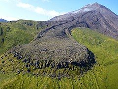 Kanaga volcano in the Aleutian Islands with a 1906 lava flow in the foreground