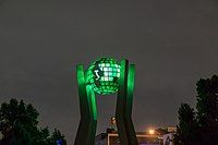 Green outdoor monument of Italy on a globe