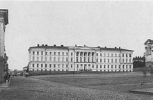 White building with large columns in front of entrance