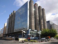 Brutalist building in glass and concrete