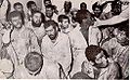 Image 28The surviving insurgents of the seizure of the Grand Mosque, 1979 under custody of Saudi authorities, c. 1980. (from History of Saudi Arabia)