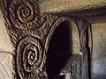 Spiraled reliefs adorn the walls of tombs