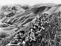 Image 15Australian soldiers resting in the Finisterre Ranges of New Guinea while en route to the front line (from New Guinea)