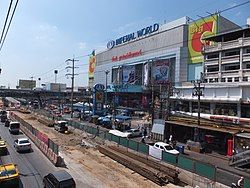 Sukhumvit Road and Imperial World Samrong with under construction Samrong BTS Station (early 2015)