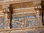 Baroque corbels with mascarons in the Salon d'Hercule (Palace of Versailles, France)